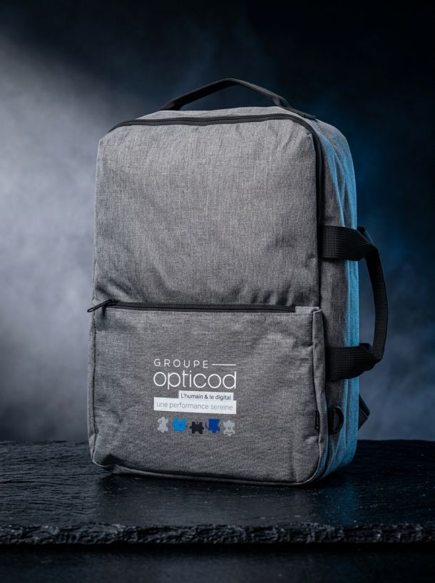 ac à dos pour ordinateur gris chiné personnalisé avec le logo du Groupe Opticod.