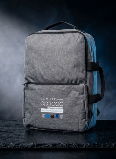 ac à dos pour ordinateur gris chiné personnalisé avec le logo du Groupe Opticod.